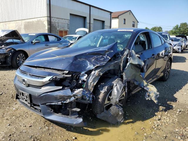 Photo 2 from auction – 2018 HONDA CIVIC EX with VIN 2HGFC1F33JH640615
