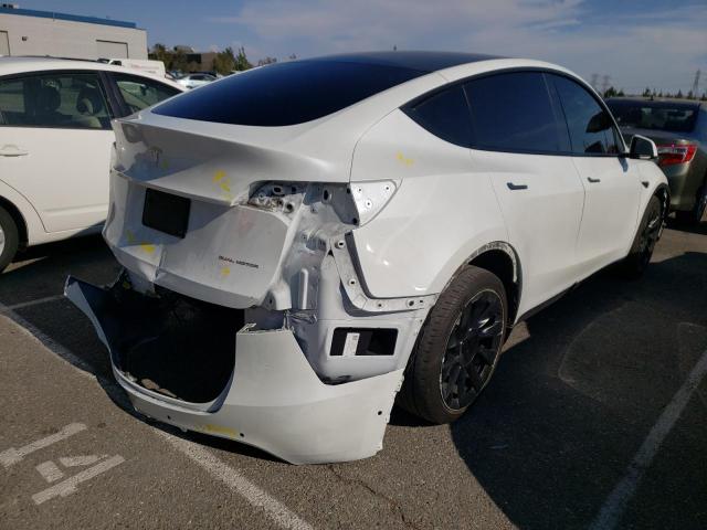 Photo 4 from auction – 2021 TESLA MODEL Y with VIN 5YJYGDEE0MF090638