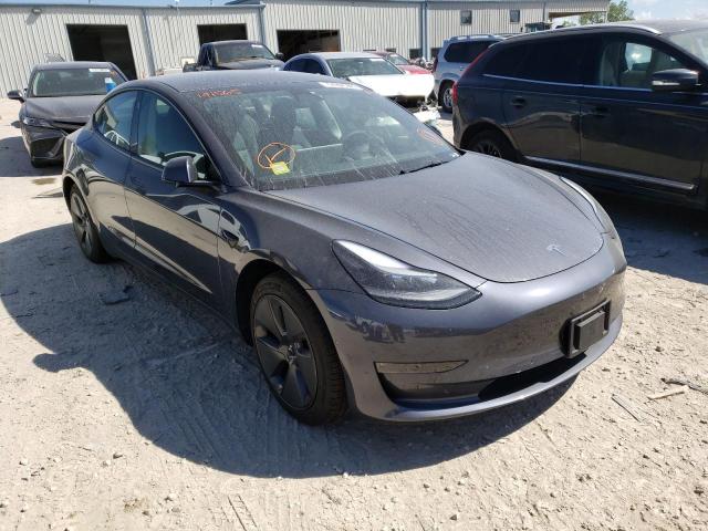 TESLA MODEL 3 2022 with VIN 5YJ3E1EB3NF191565 - Photo from auction