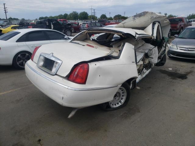 Photo 4 from auction – 2000 LINCOLN TOWN CAR E with VIN 1LNHM81W4YY888267