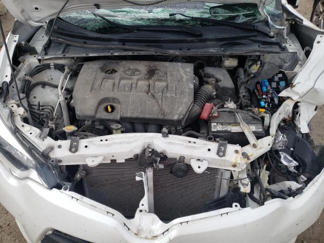 Photo 7 from auction – 2014 TOYOTA COROLLA EC with VIN 5YFBPRHE0EP028239