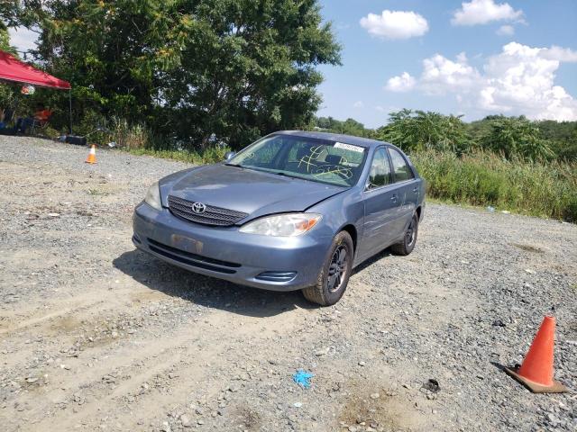 Photo 9 from auction – 2002 TOYOTA CAMRY LE with VIN JTDBE32K220107659