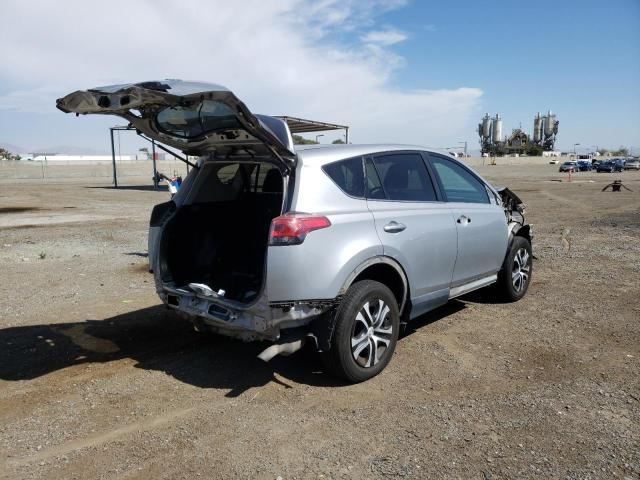 Photo 4 from auction – 2018 TOYOTA RAV4 LE with VIN 2T3BFREV2JW761402