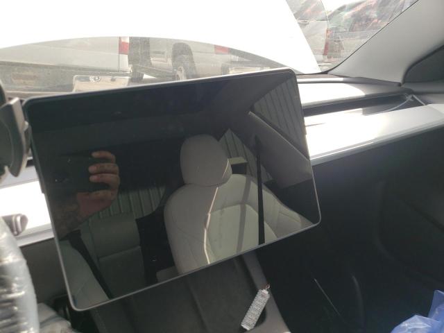 Photo 8 from auction – 2021 TESLA MODEL 3 with VIN 5YJ3E1EA4MF032138