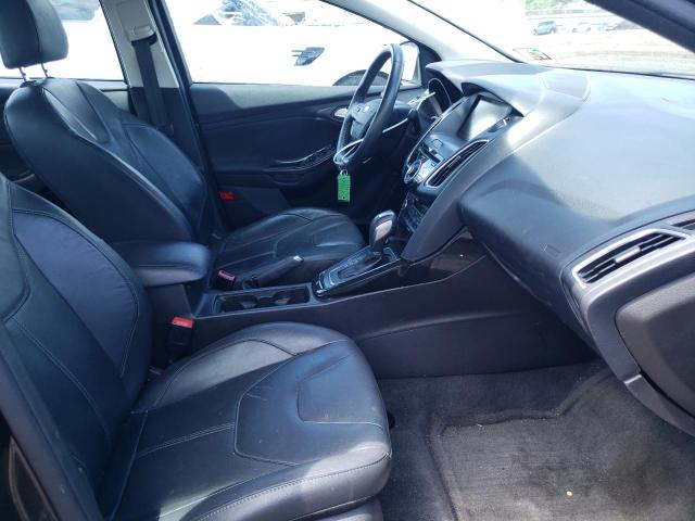 Photo 5 from auction – 2015 FORD FOCUS TITA with VIN 1FADP3J26FL279403