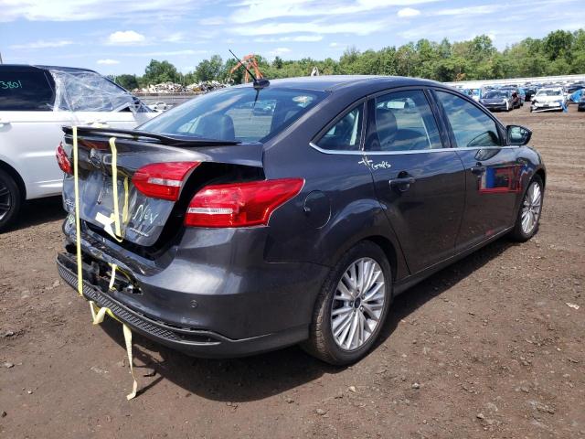 Photo 4 from auction – 2015 FORD FOCUS TITA with VIN 1FADP3J26FL279403