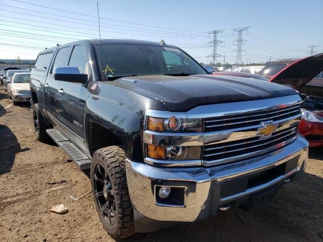 CHEVROLET SILVERADO 2015 z numerem VIN 1GC1KWE85FF142382 - Zdjęcie z aukcji