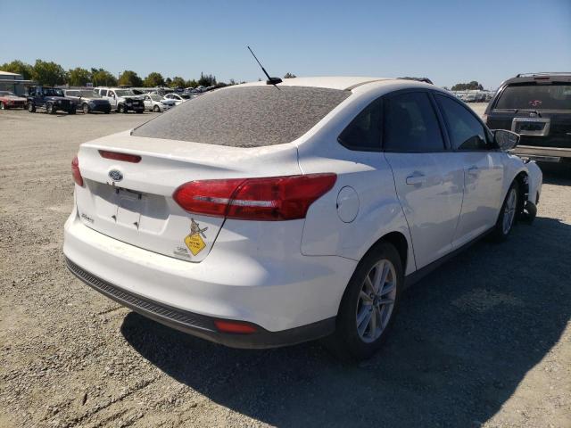 Photo 4 from auction – 2018 FORD FOCUS SE with VIN 1FADP3FE1JL260687