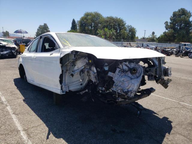TOYOTA CAMRY LE 2022 with VIN 4T1C11AK2NU664277 - Photo from auction