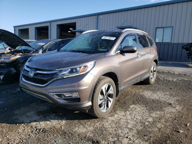 Photo 2 from auction – 2016 HONDA CR-V TOURI with VIN 5J6RM4H90GL128229