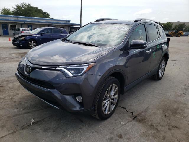 Photo 2 from auction – 2018 TOYOTA RAV4 LIMIT with VIN 2T3YFREV8JW450373