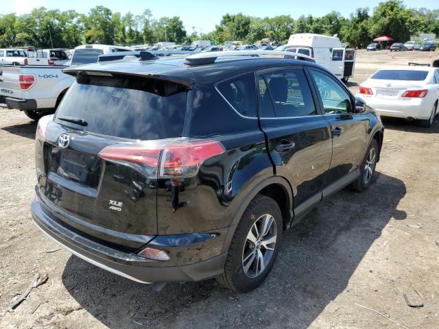Photo 4 from auction – 2016 TOYOTA RAV4 XLE with VIN 2T3RFREV2GW464542