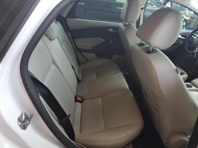 Foto 6 de la subasta – 2013 FORD FOCUS SE con VIN 1FADP3K20DL213733