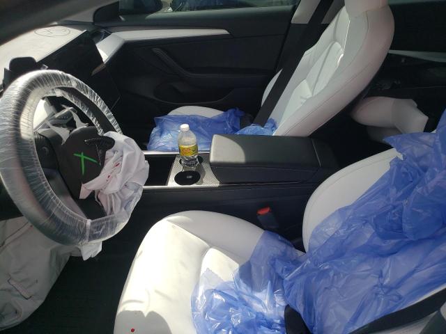 Photo 5 from auction – 2021 TESLA MODEL 3 with VIN 5YJ3E1EA4MF032138