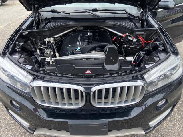 Photo 7 from auction – 2014 BMW X5 XDRIVE3 with VIN 5UXKR0C5XE0H20369
