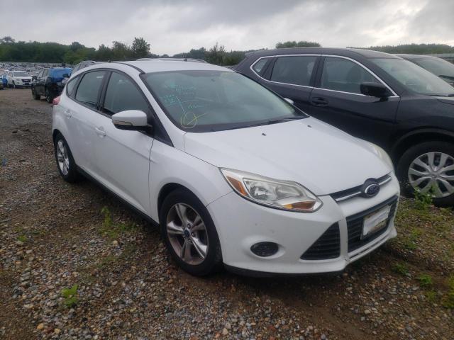 FORD FOCUS SE 2014 with VIN 1FADP3K29EL157227 - Photo from auction