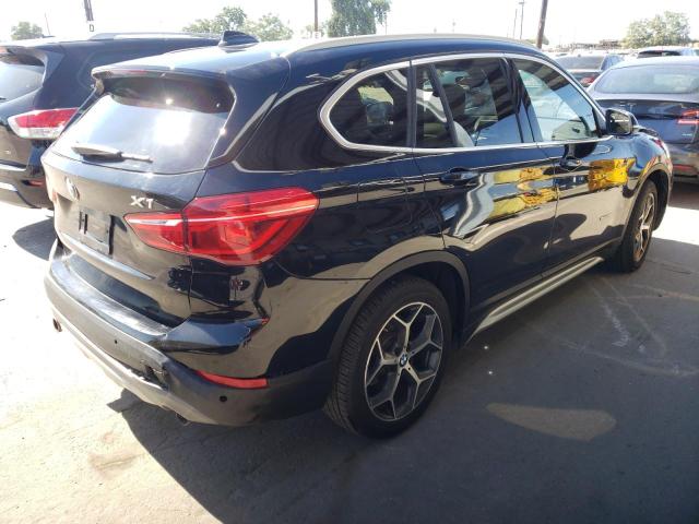 Photo 4 from auction – 2018 BMW X1 XDRIVE2 with VIN WBXHT3Z31J4A67053