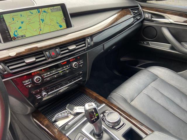 Photo 9 from auction – 2014 BMW X5 XDRIVE3 with VIN 5UXKR0C5XE0H20369