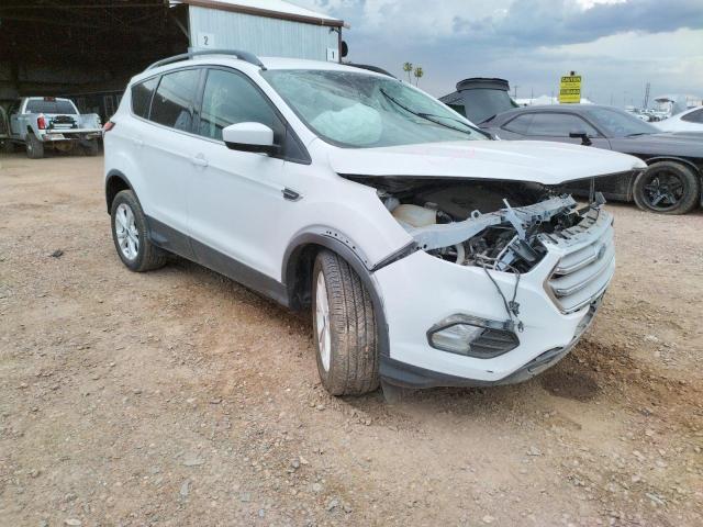 FORD ESCAPE SE 2017 with VIN 1FMCU9GD5HUC96423 - Photo from auction