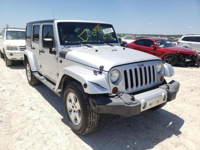 JEEP WRANGLER U 2011 with VIN 1J4BA5H13BL569680 - Photo from auction