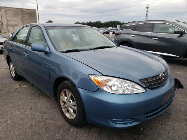 TOYOTA CAMRY LE 2004 with VIN 4T1BF30K04U588678 - Photo from auction