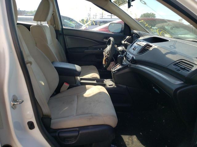 Photo 5 from auction – 2015 HONDA CR-V LX with VIN 5J6RM4H30FL042185