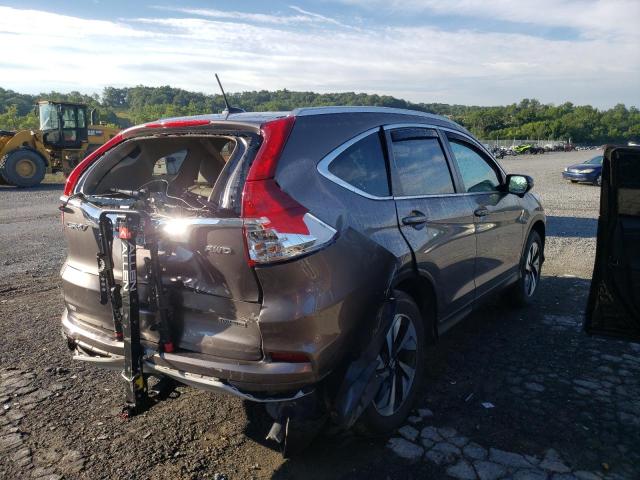 Photo 4 from auction – 2016 HONDA CR-V TOURI with VIN 5J6RM4H90GL128229