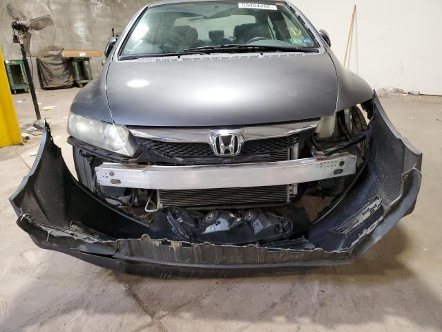 Photo 9 from auction – 2011 HONDA CIVIC LX with VIN 19XFA1F58BE036139