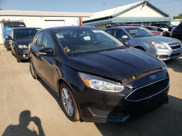 FORD FOCUS SE 2015 with VIN 1FADP3F21FL374332 - Photo from auction