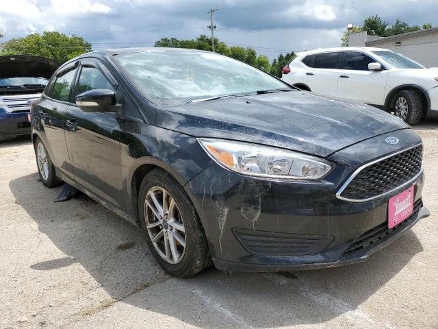 FORD FOCUS SE 2016 with VIN 1FADP3F2XGL217335 - Photo from auction