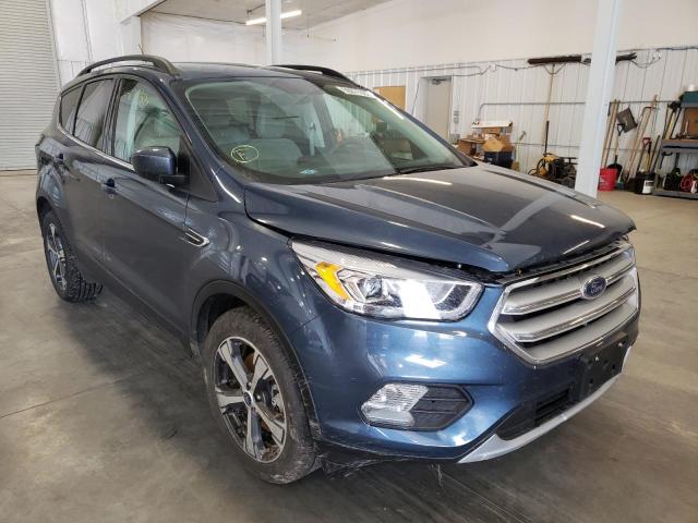 FORD ESCAPE SEL 2018 with VIN 1FMCU9HD9JUB73857 - Photo from auction