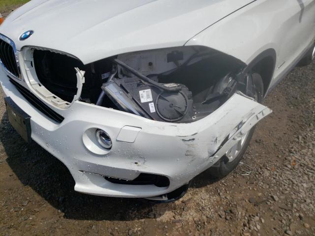 Photo 9 from auction – 2015 BMW X5 XDRIVE3 with VIN 5UXKR0C52F0K64057