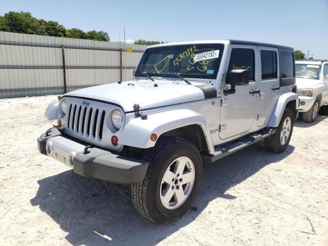 Photo 2 from auction – 2011 JEEP WRANGLER U with VIN 1J4BA5H13BL569680