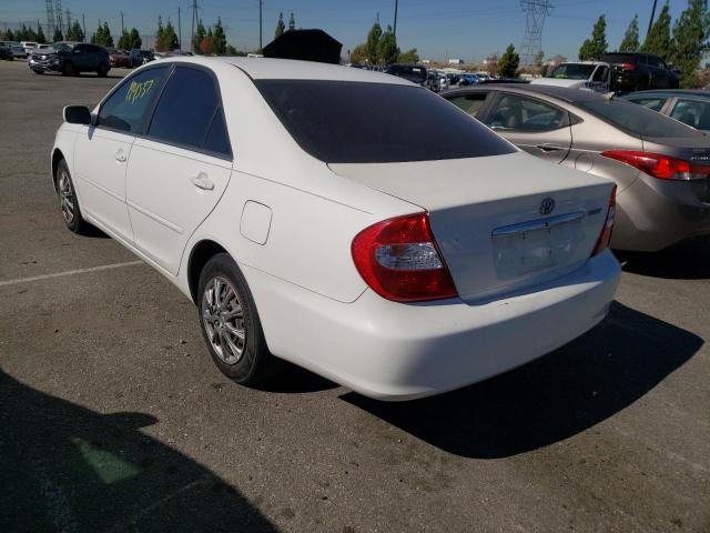 Photo 3 from auction – 2004 TOYOTA CAMRY LE with VIN JTDBE32K140281287