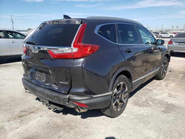 Photo 4 from auction – 2017 HONDA CR-V TOURI with VIN 7FARW1H91HE025926