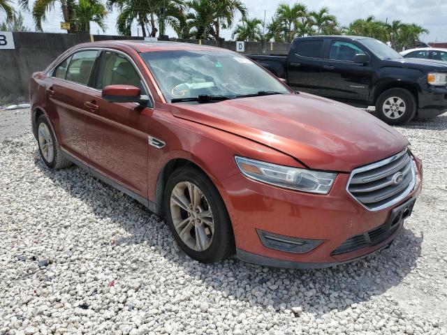 FORD TAURUS SEL 2014 with VIN 1FAHP2H80EG124987 - Photo from auction