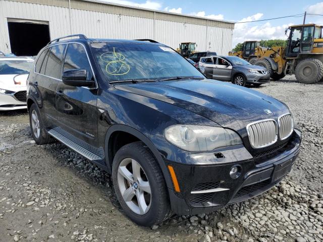BMW X5 XDRIVE5 2011 with VIN 5UXZV8C5XBL419004 - Photo from auction
