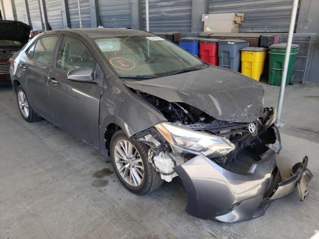 TOYOTA COROLLA L 2014 with VIN 5YFBURHE1EP163741 - Photo from auction