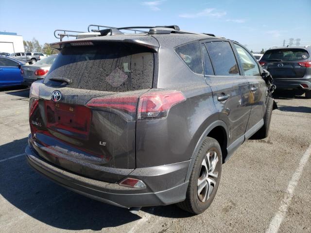 Photo 4 from auction – 2017 TOYOTA RAV4 LE with VIN JTMZFREV5HJ133390