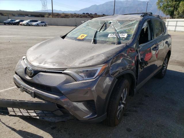 Photo 2 from auction – 2017 TOYOTA RAV4 LE with VIN JTMZFREV5HJ133390