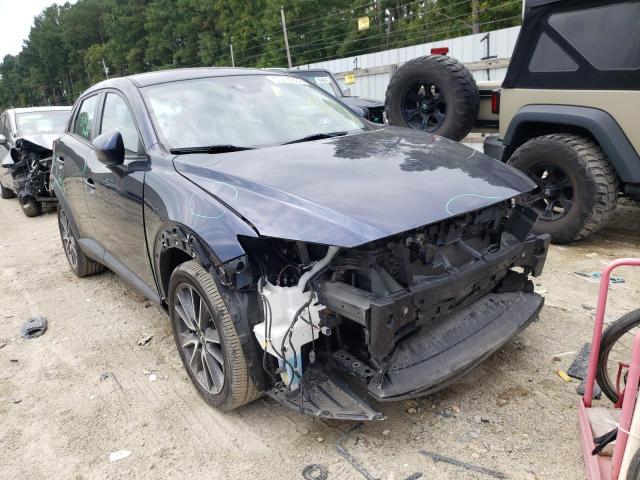 MAZDA CX-3 TOURI 2018 with VIN JM1DKFC72J0319389 - Photo from auction