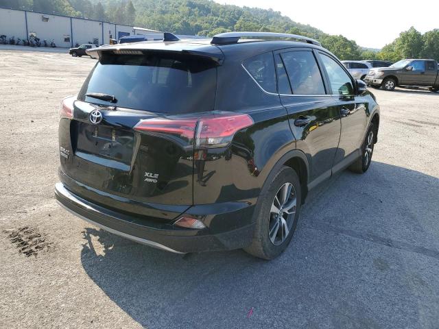 Photo 4 from auction – 2018 TOYOTA RAV4 ADVEN with VIN 2T3RFREV2JW759082