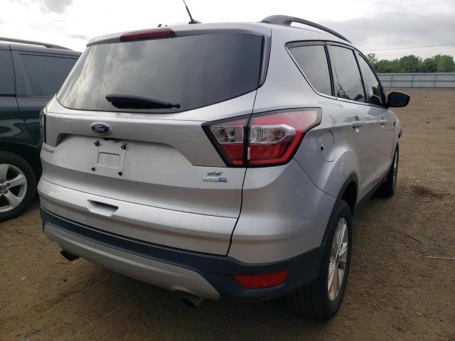Photo 4 from auction – 2018 FORD ESCAPE SE with VIN 1FMCU9GDXJUB93536