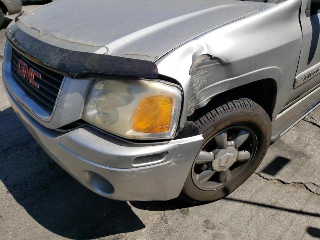 Photo 9 from auction – 2005 GMC ENVOY with VIN 1GKDT13S952330909