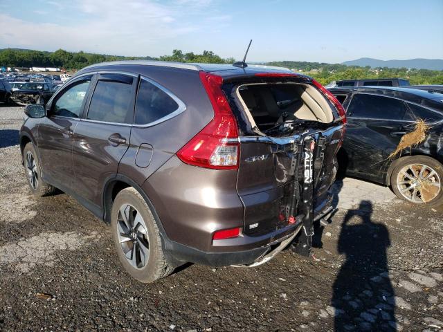 Photo 3 from auction – 2016 HONDA CR-V TOURI with VIN 5J6RM4H90GL128229