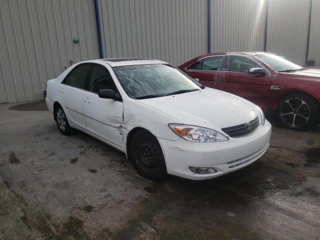 TOYOTA CAMRY XLE 2004 with VIN 4T1BF30K84U074884 - Photo from auction