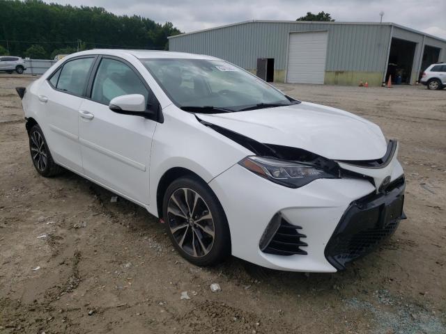 TOYOTA COROLLA 2017 with VIN 2T1BURHE1HC807985 - Photo from auction