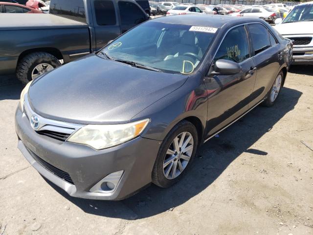 Photo 2 from auction – 2012 TOYOTA CAMRY HYBR with VIN 4T1BD1FK1CU024649