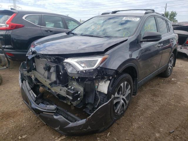 Photo 2 from auction – 2018 TOYOTA RAV4 LE with VIN 2T3ZFREV7JW415683