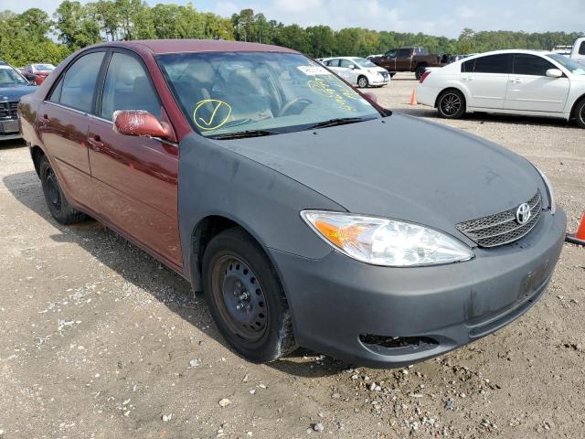 TOYOTA CAMRY LE 2002 with VIN JTDBE32K020072099 - Photo from auction